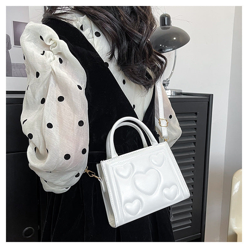 1pc Women’s Stylish Solid Color Handbag with Detachable Strap – Heart Pattern Design, Perfect for Valentine’s Day Gift, Available in Magenta, White, Black, Green, Yellow